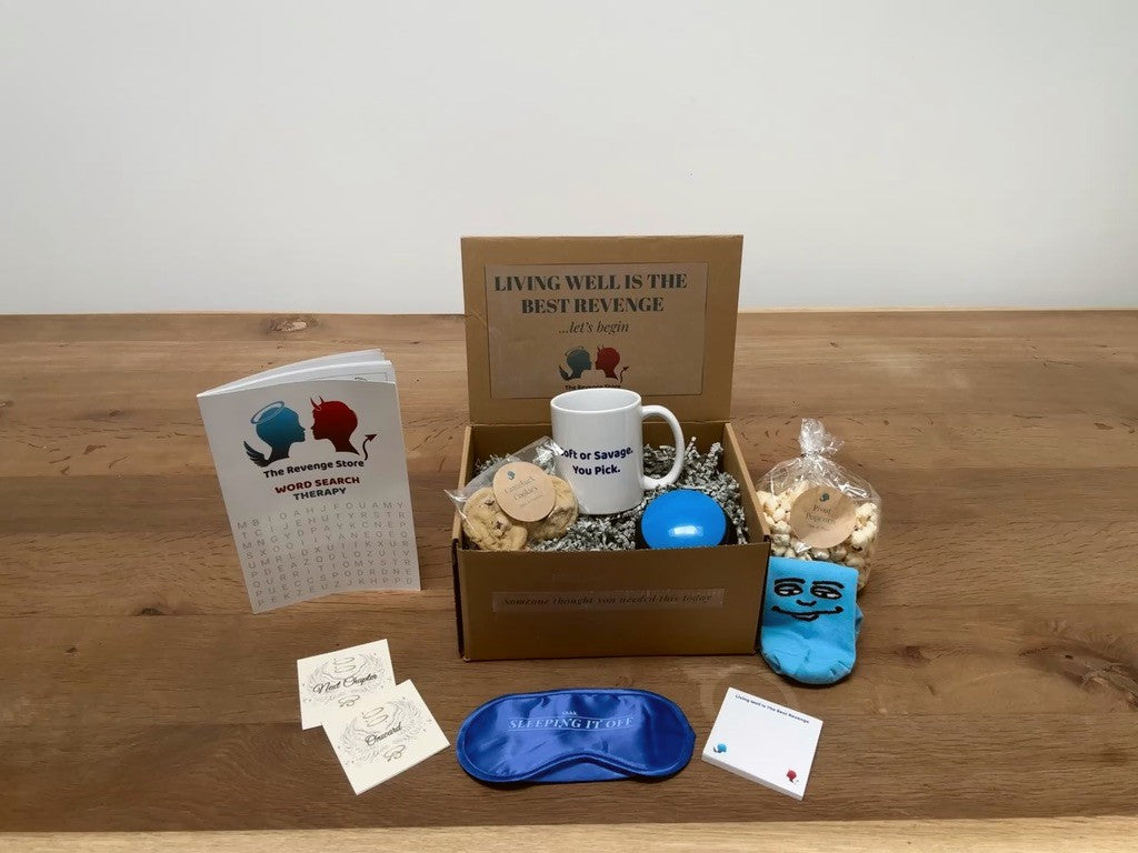 An open Revenge Store gift box with contents